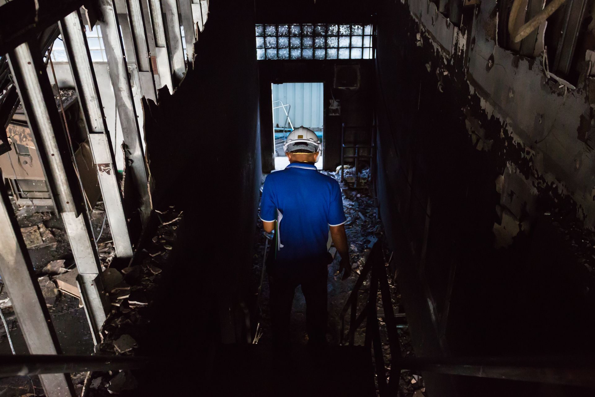 Fire-damaged interior structure under cause-and-extent investigation